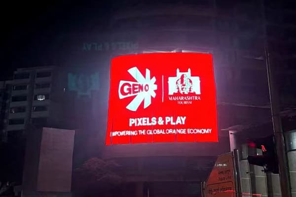 A media facade displaying a luxury brand advertisement